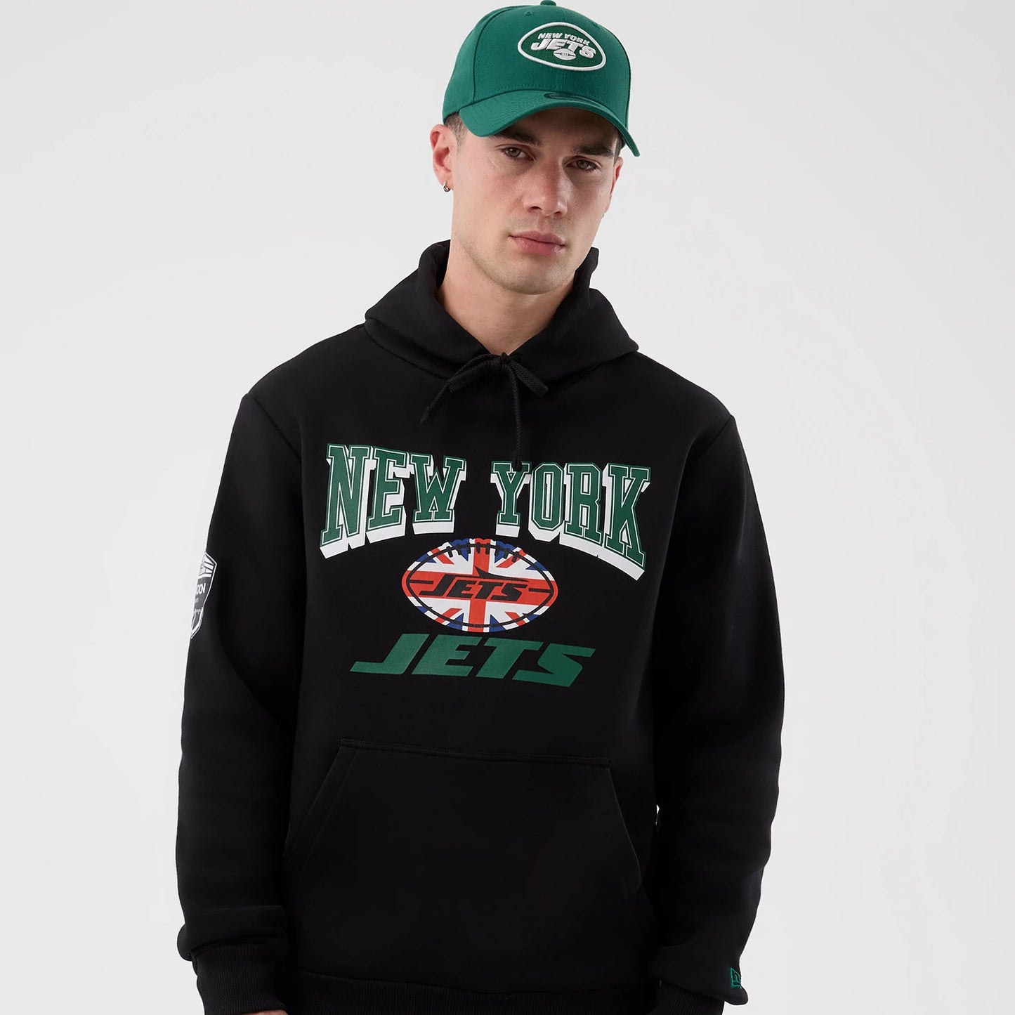 The Male model is wearing New York Jets NFL International Series Games Black Pullover Hoodie 6