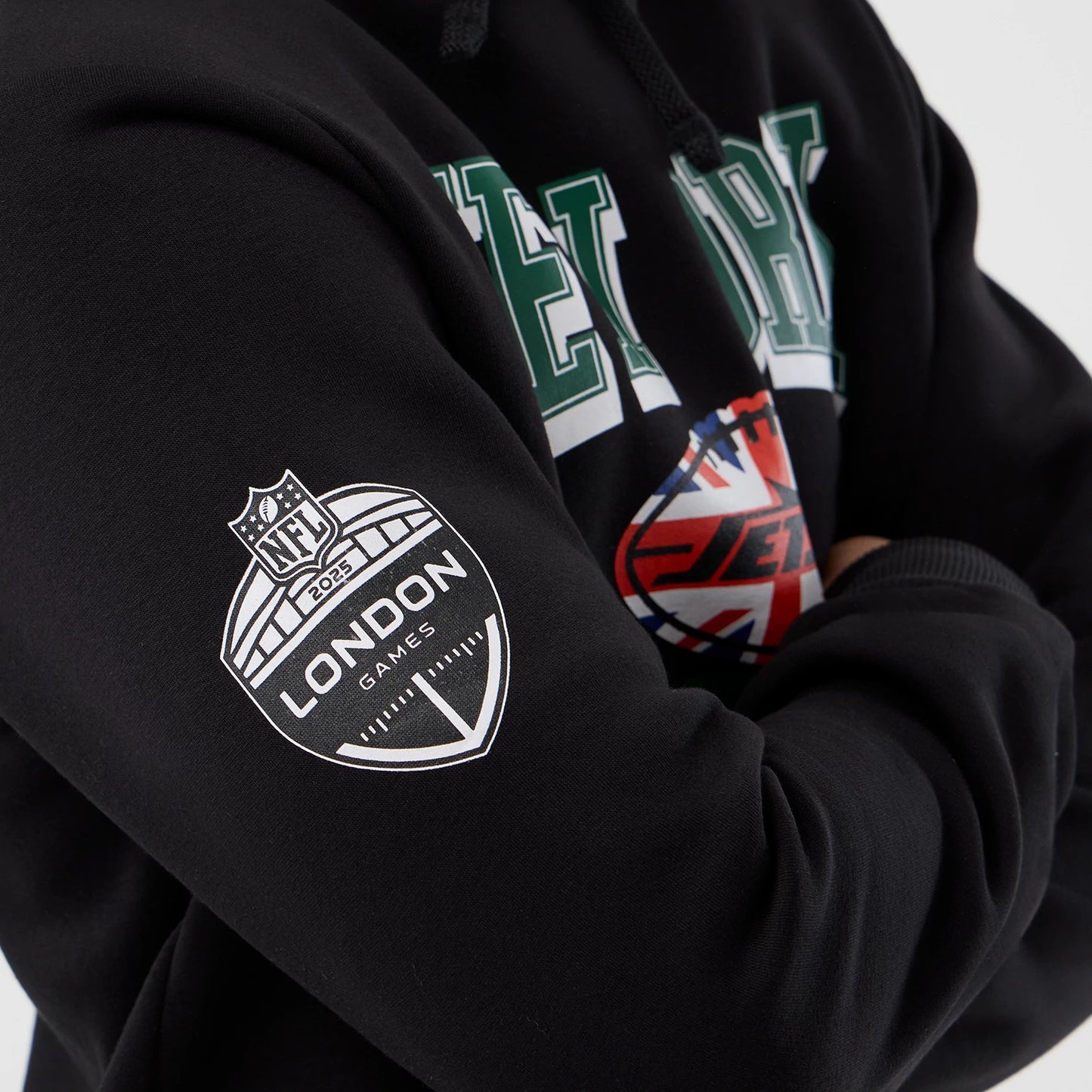 The Male model is wearing New York Jets NFL International Series Games Black Pullover Hoodie 4