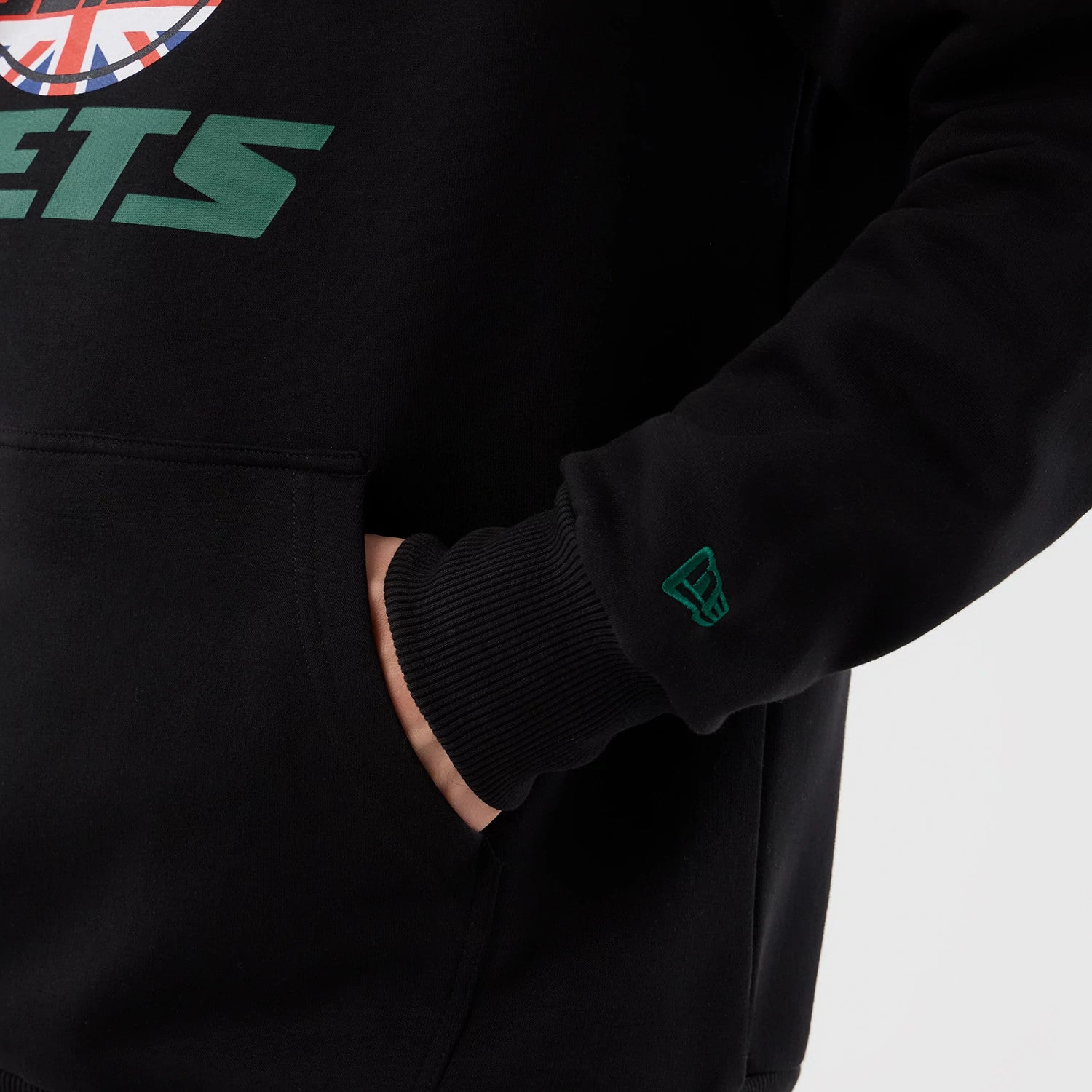 The Male model is wearing New York Jets NFL International Series Games Black Pullover Hoodie 5