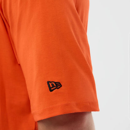 The Male model is wearing Cleveland Browns NFL International Series Games Orange Oversized T-Shirt 6