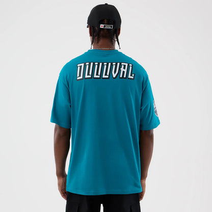 The Male model is wearing Jacksonville Jaguars NFL International Series Games Turquoise Oversized T-Shirt 2