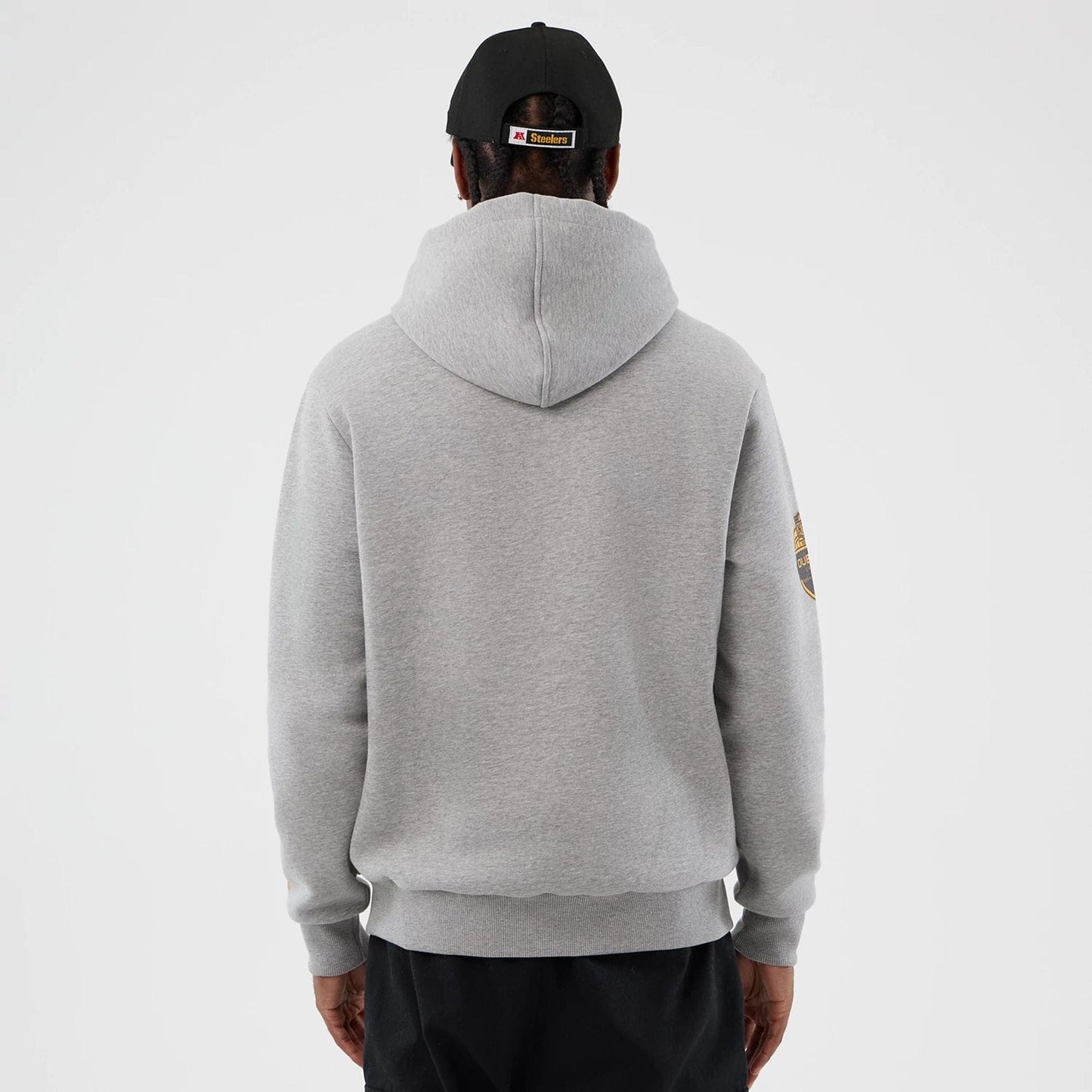 The Male model is wearing Pittsburgh Steelers NFL International Series Games Grey Pullover Hoodie  2