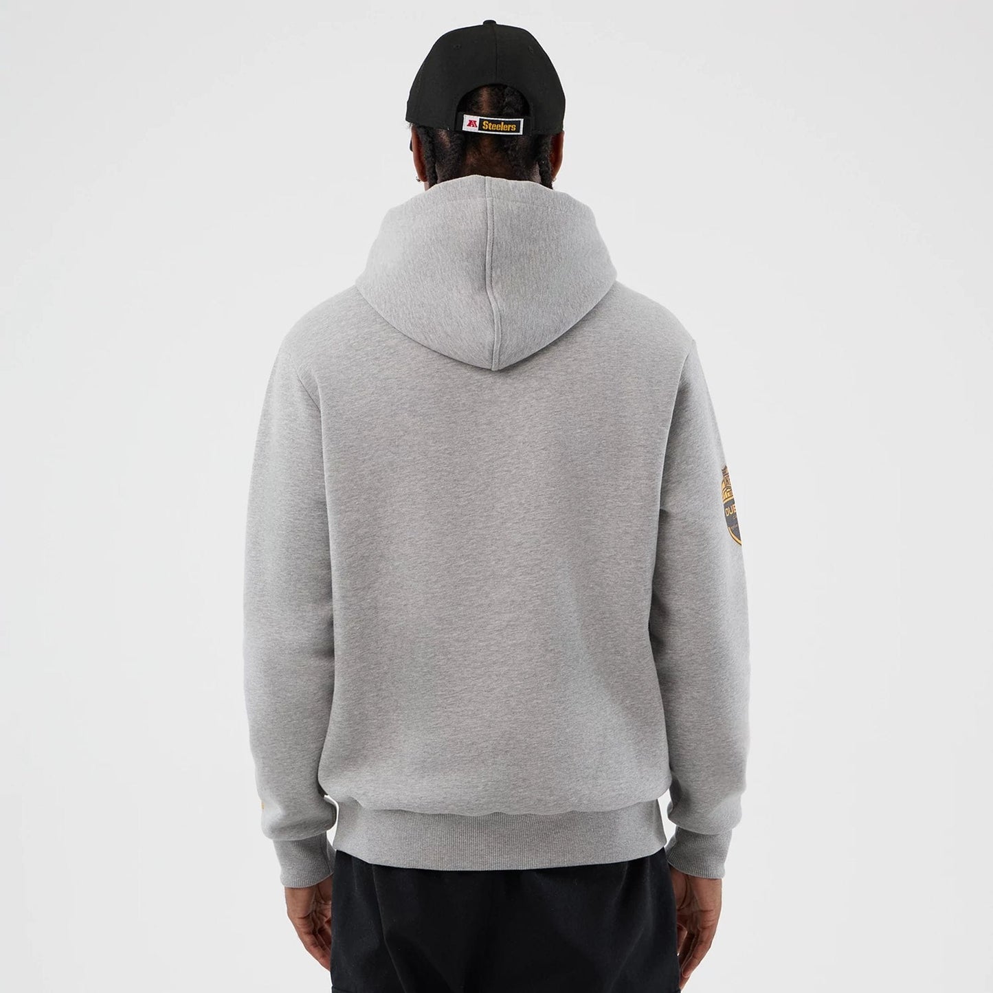 The Male model is wearing Pittsburgh Steelers NFL International Series Games Grey Pullover Hoodie  2