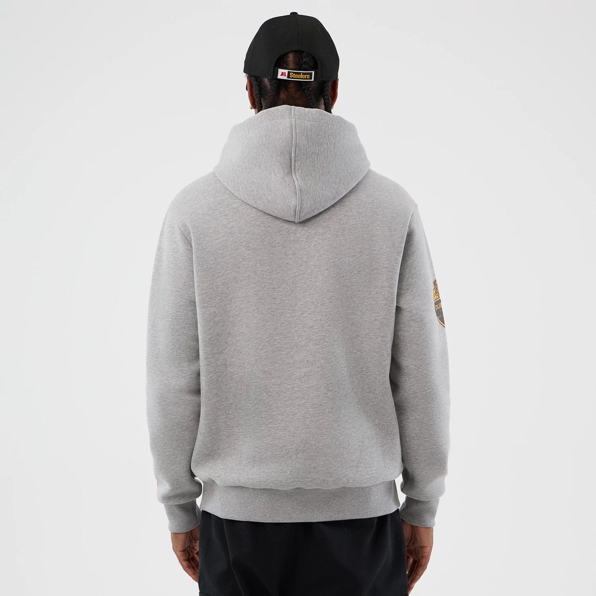 The Male model is wearing Pittsburgh Steelers NFL International Series Games Grey Pullover Hoodie  2
