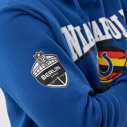 New Era Indianapolis Colts NFL International Series Games Blue Pullover Hoodie, three-quarter view showing a printed NFL Berlin Game shield logo on the left sleeve and Indianapolis lettering across the chest with the Colts logo.