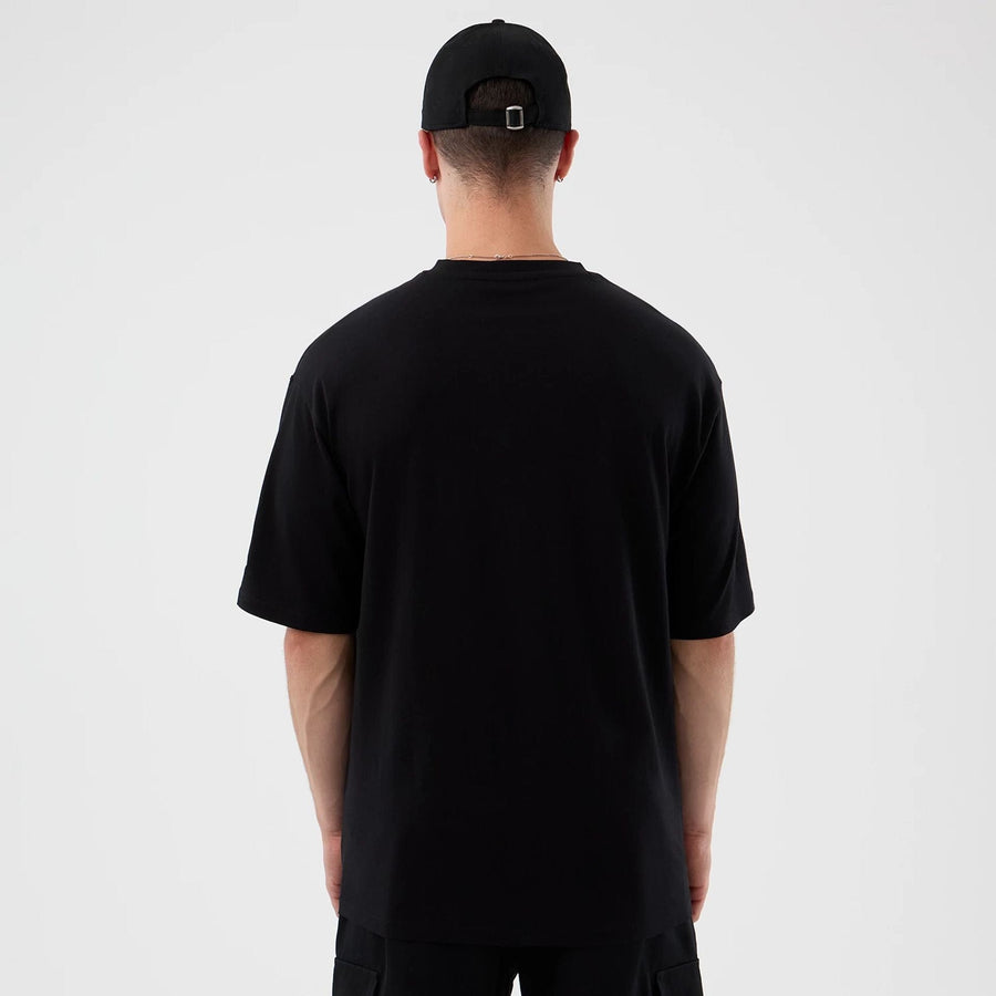 The Male model is wearing London Games NFL International Series Games Black Oversized T-Shirt  2