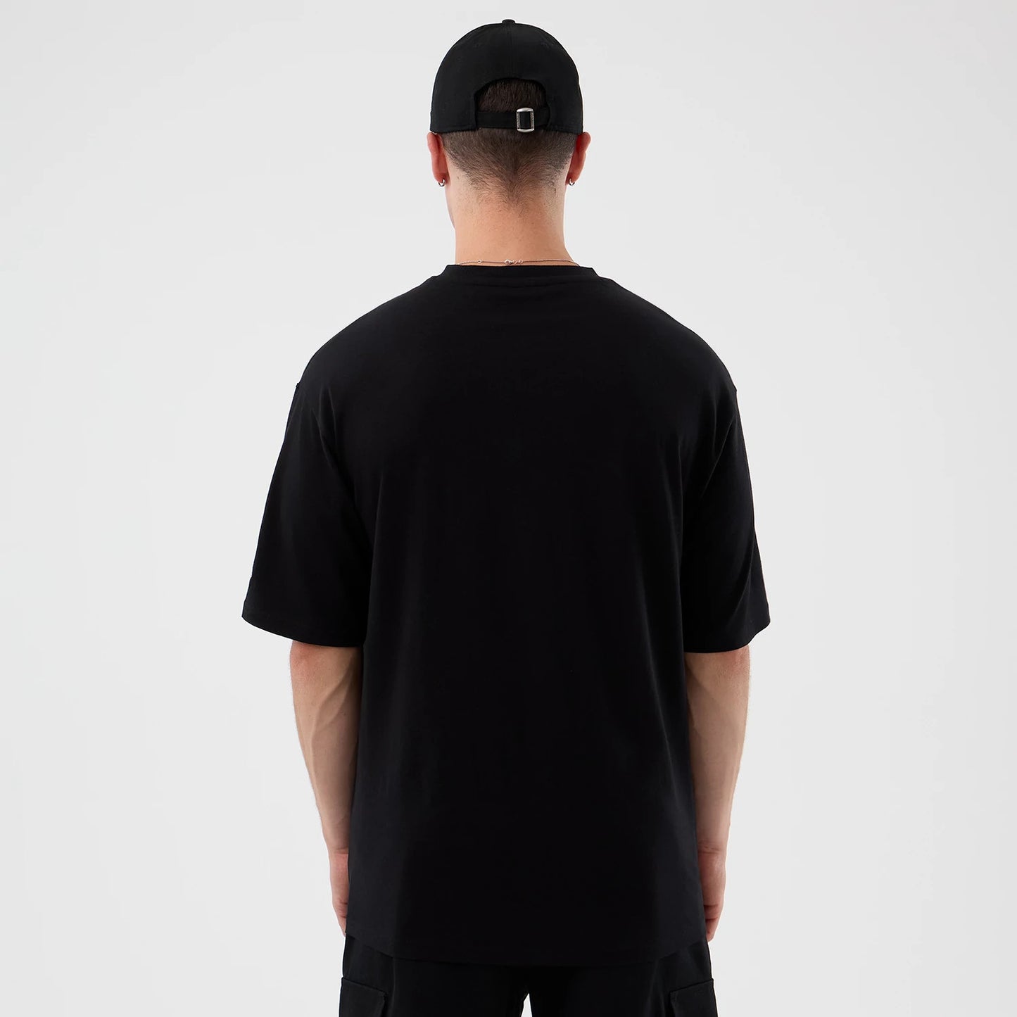 The Male model is wearing London Games NFL International Series Games Black Oversized T-Shirt 2