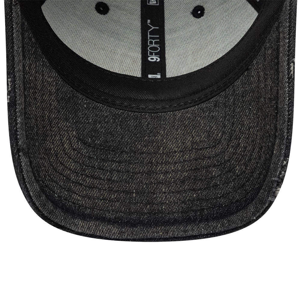 Stranger Things Distressed Black New Era 9FORTY Adjustable Cap, inside view showing grey taping with New Era branding, black sweatband, and a dark distressed undervisor with stitching detail.