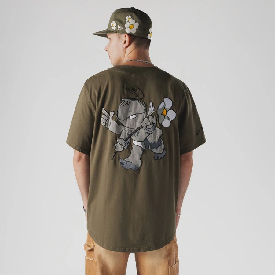 The Male model is wearing  New Era x Rodrigo Roji Flower Green Jersey  2