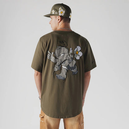 The Male model is wearing  New Era x Rodrigo Roji Flower Green Jersey 2