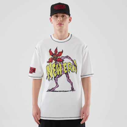 The Male model is wearing Stranger Things White Oversized T-Shirt 1