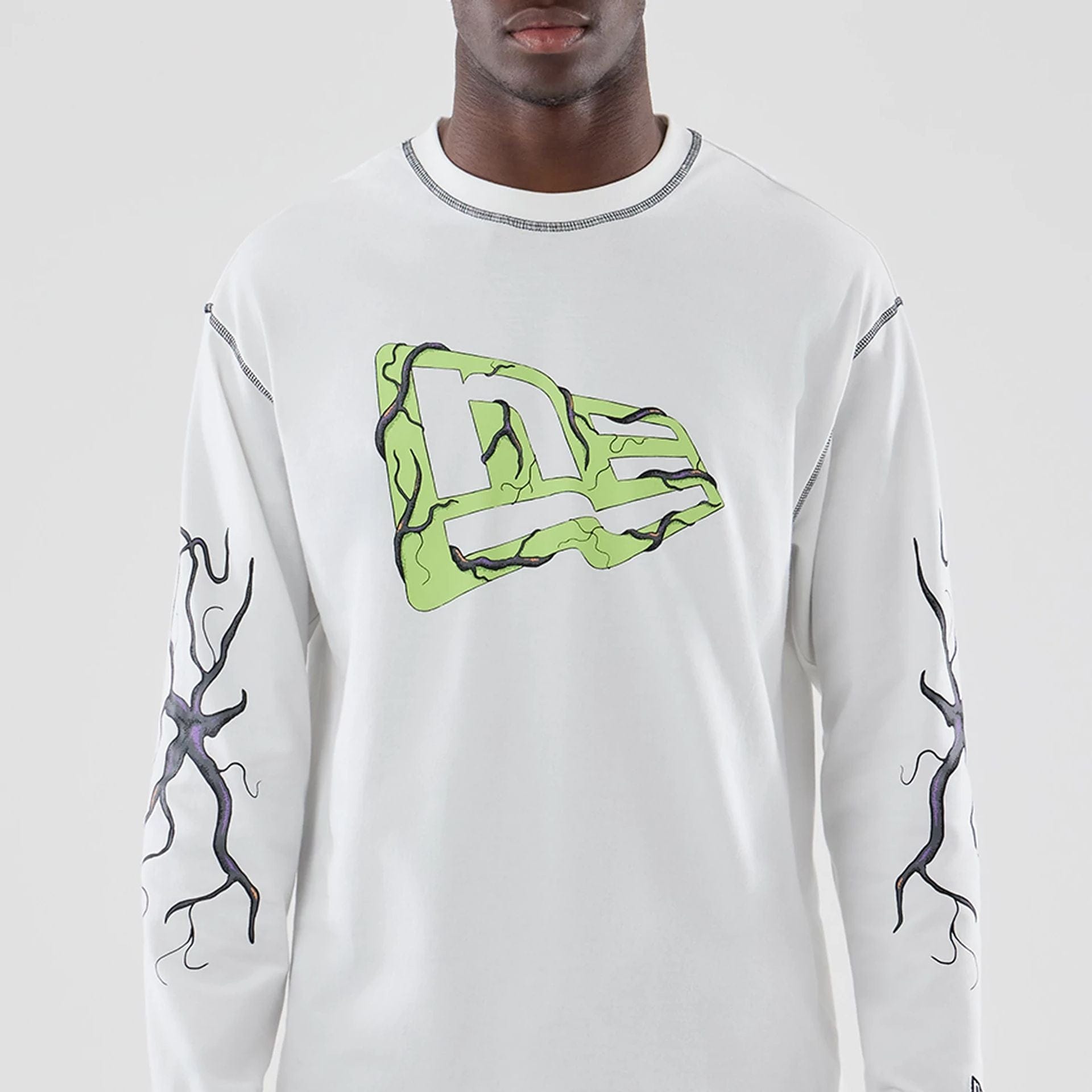 The Male model is wearing Stranger Things White Oversized Long Sleeve T-Shirt  3