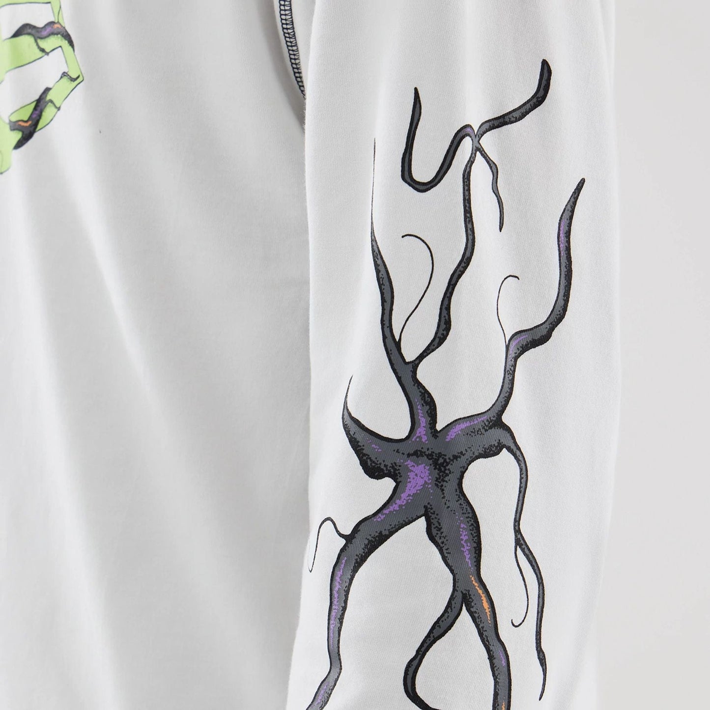 The Male model is wearing Stranger Things White Oversized Long Sleeve T-Shirt  6