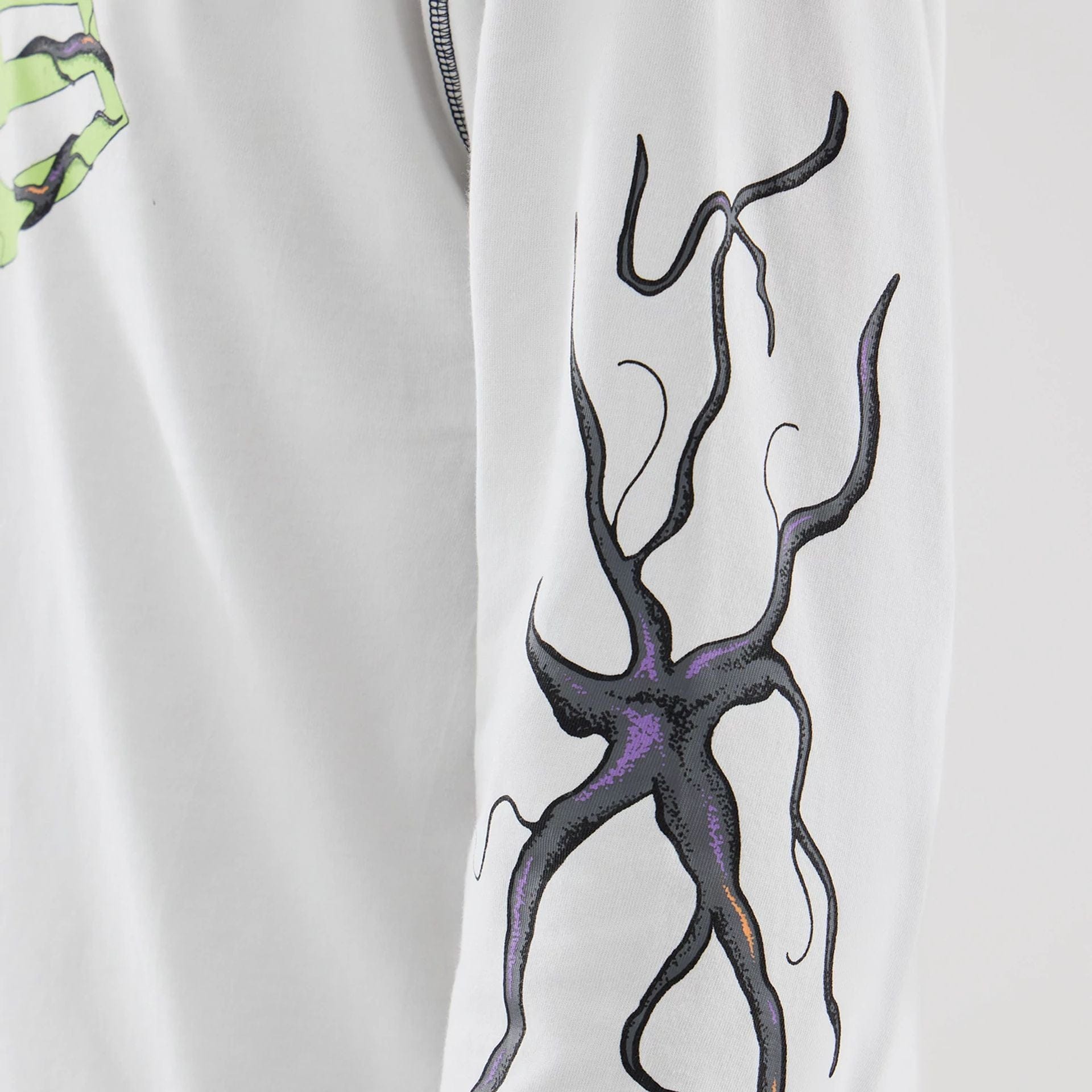 The Male model is wearing Stranger Things White Oversized Long Sleeve T-Shirt  6