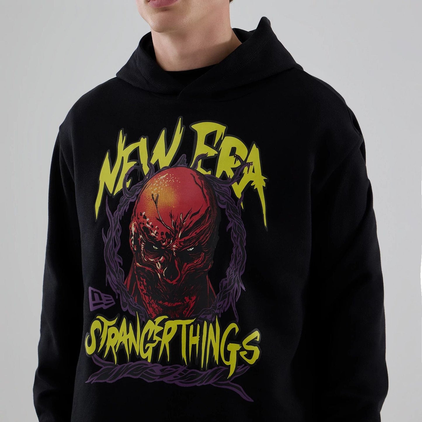 The Male model is wearing Stranger Things Black Oversized Pullover Hoodie  6