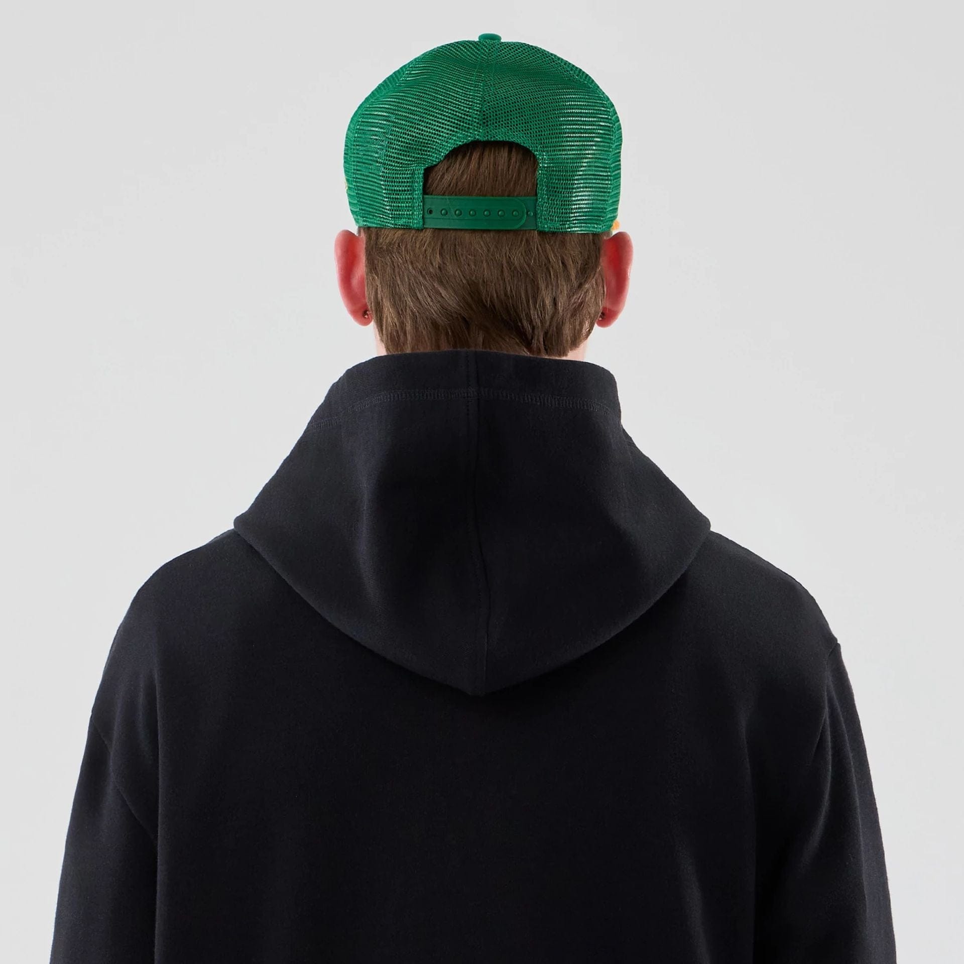 The Male model is wearing Stranger Things Black Oversized Pullover Hoodie  7