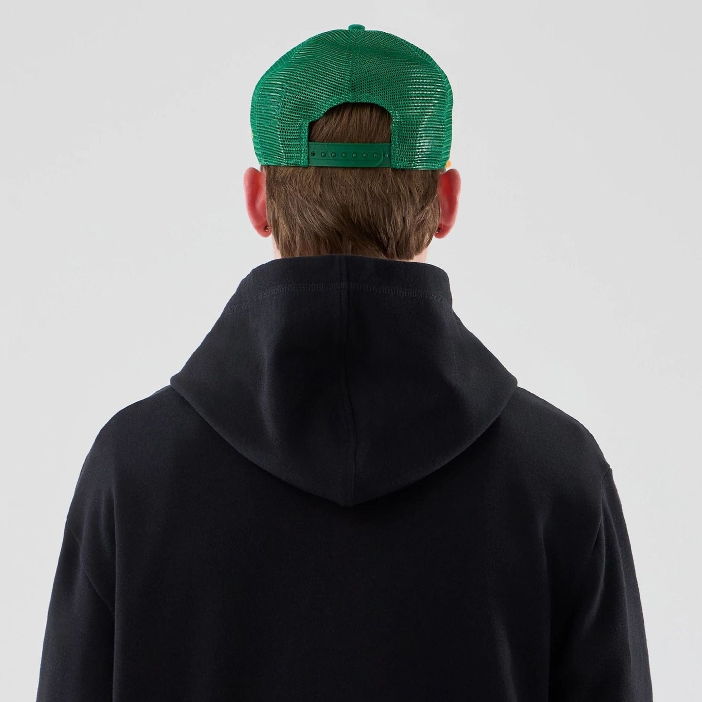 The Male model is wearing Stranger Things Black Oversized Pullover Hoodie  7