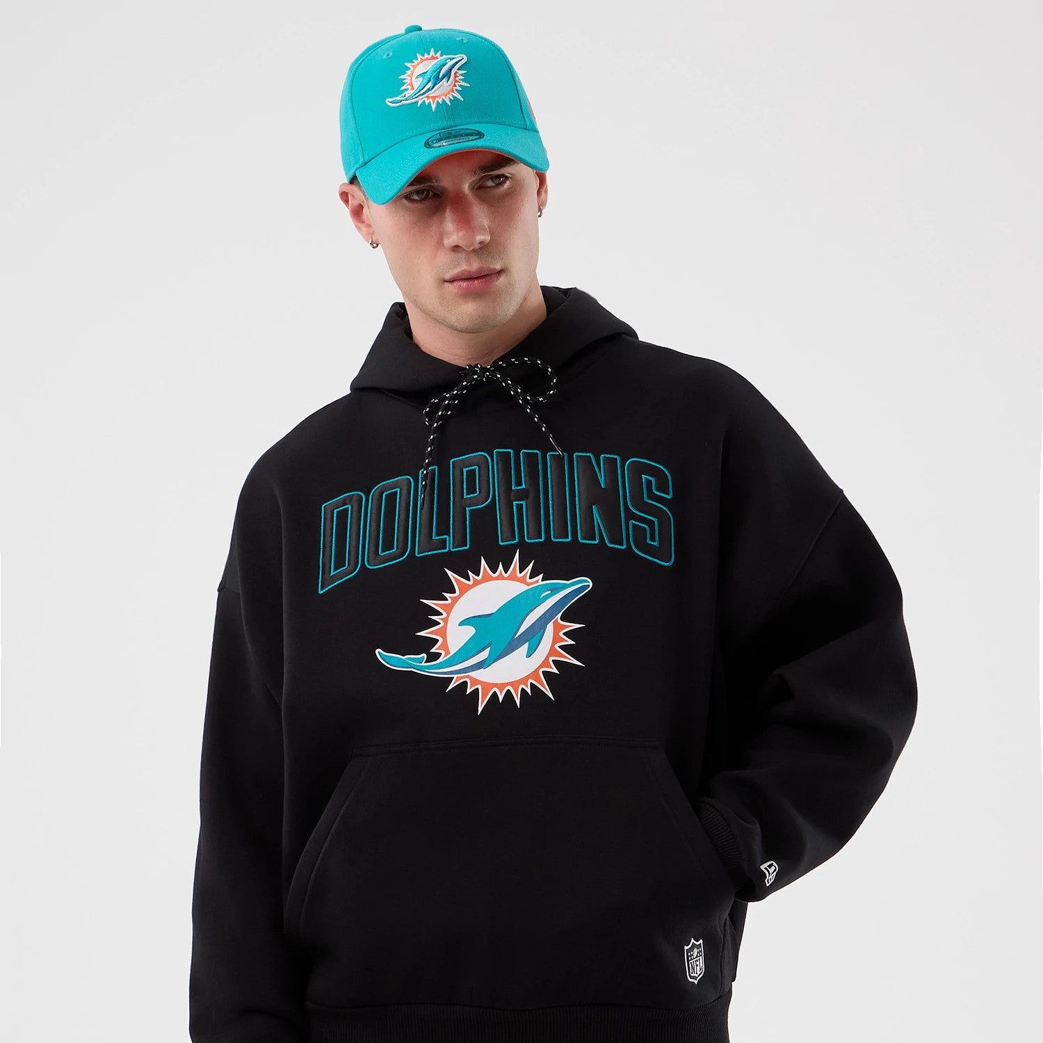 The Male model is wearing Miami Dolphins NFL International Series Games Black Pullover Hoodie 4