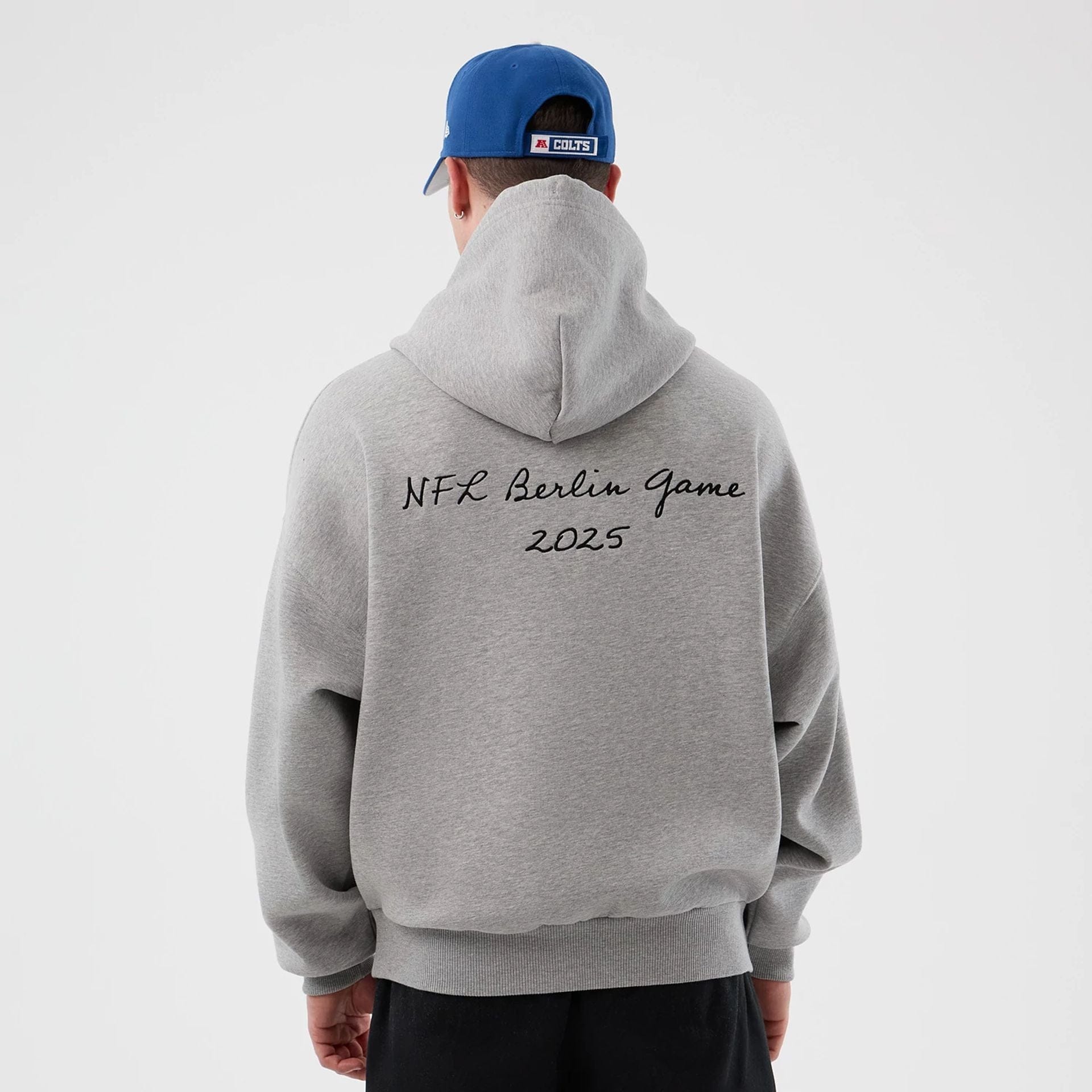 The Male model is wearing Indianapolis Colts NFL International Series Games Grey Pullover Hoodie  2