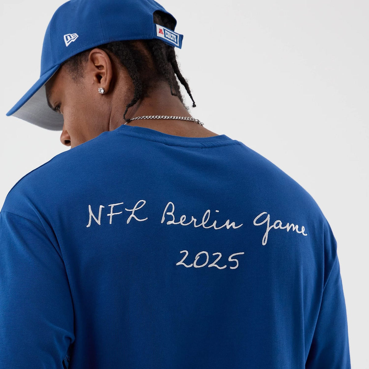 The Male model is wearing Indianapolis Colts NFL International Series Games Berlin Blue Oversized T-Shirt 6