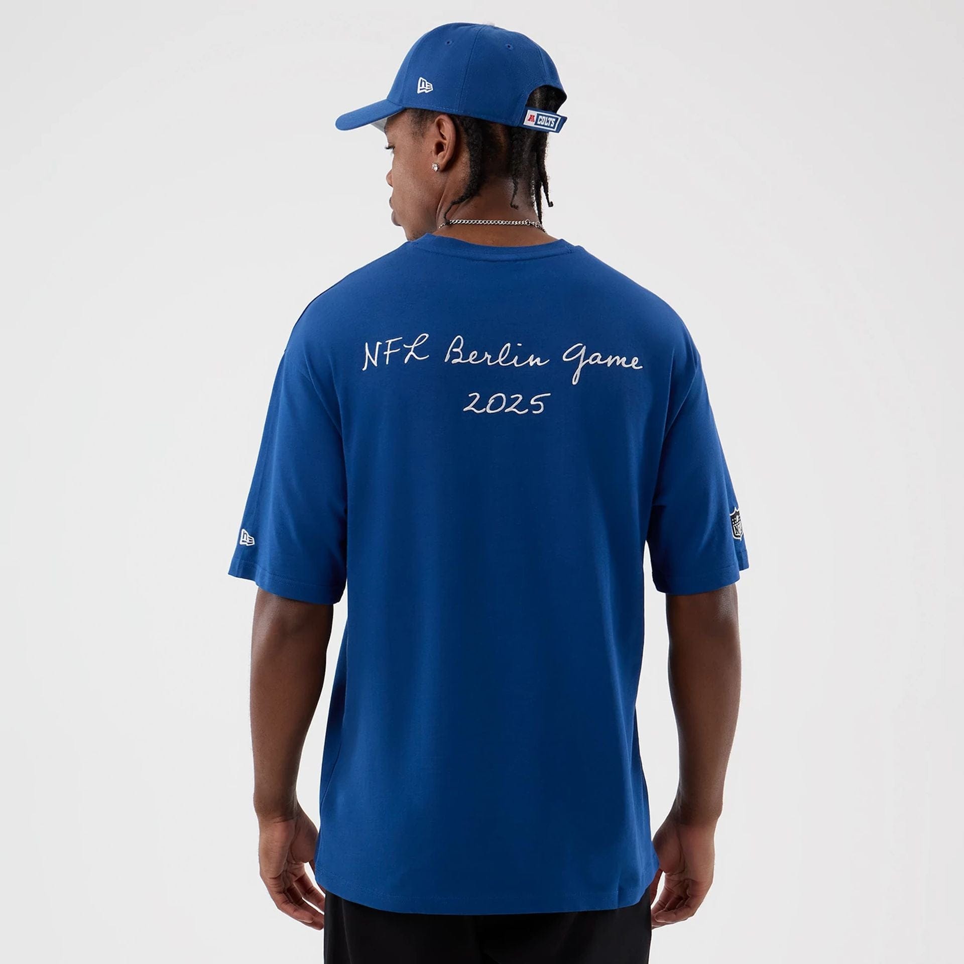 The Male model is wearing Indianapolis Colts NFL International Series Games Blue Oversized T-Shirt  2