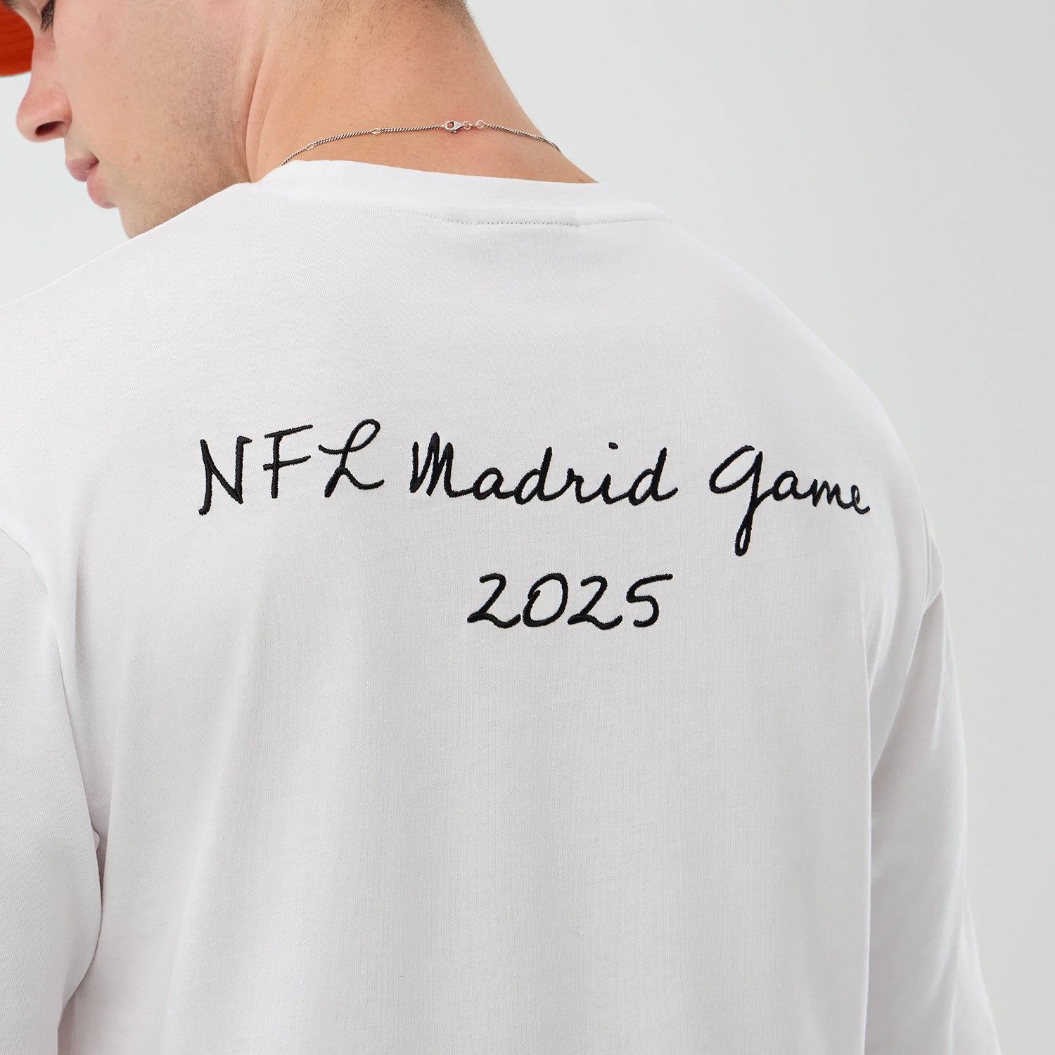 The Male model is wearing Miami Dolphins NFL International Series Games Script White Oversized T-Shirt 5