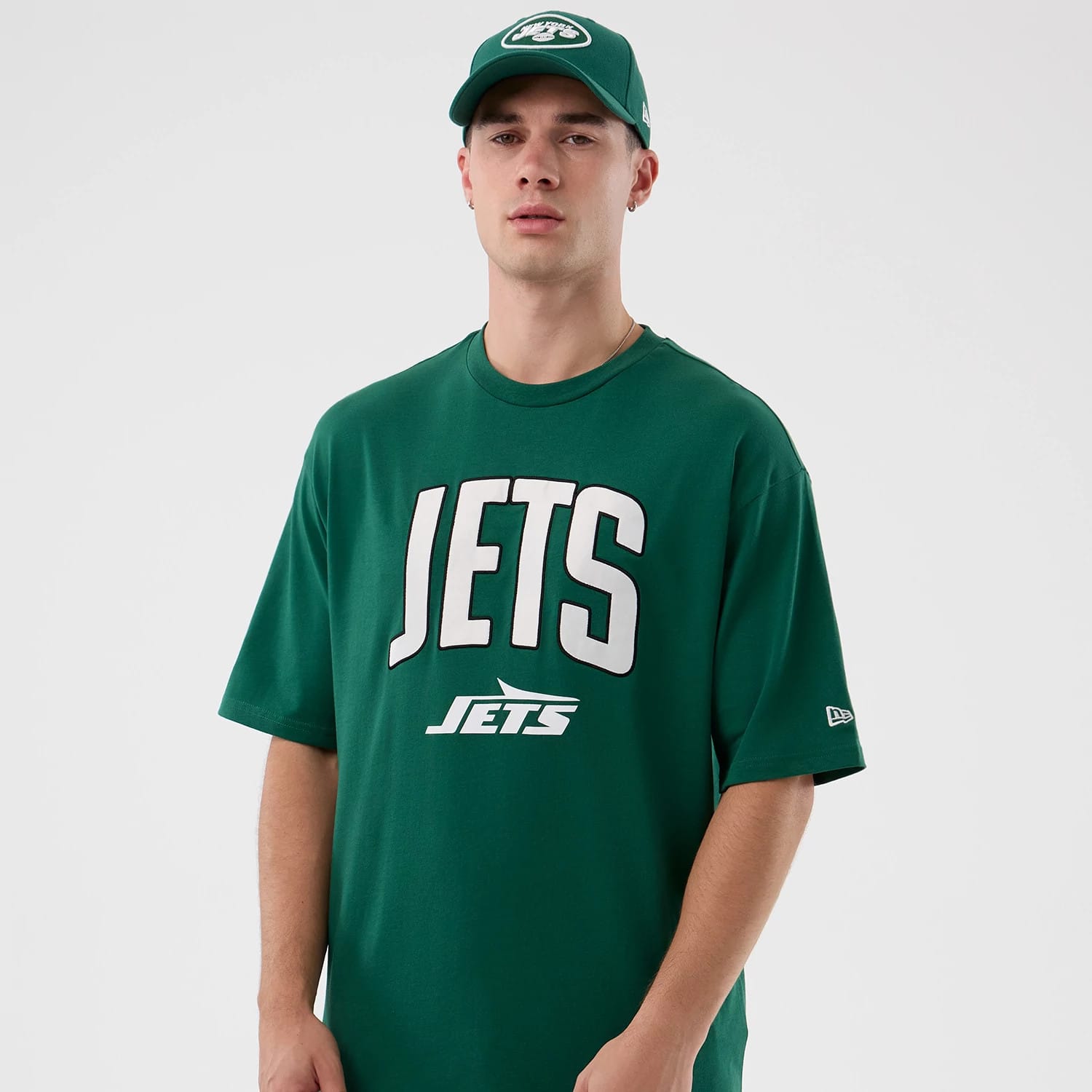 The Male model is wearing New York Jets NFL International Series Games Green Oversized T-Shirt 6