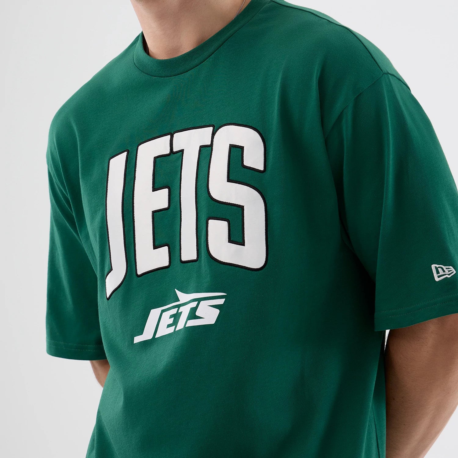 The Male model is wearing New York Jets NFL International Series Games Green Oversized T-Shirt 5