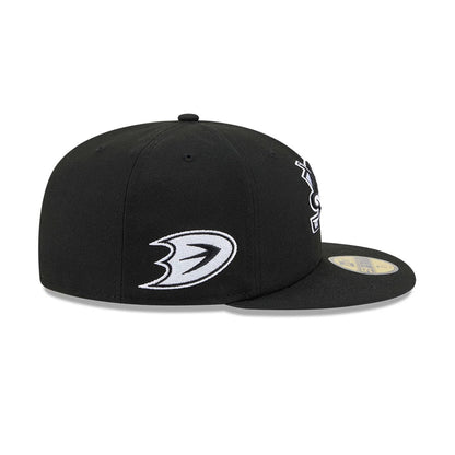 Pictured is this NHL Evergreen Anaheim Ducks 59FIFTY Fitted cap in Black. 7