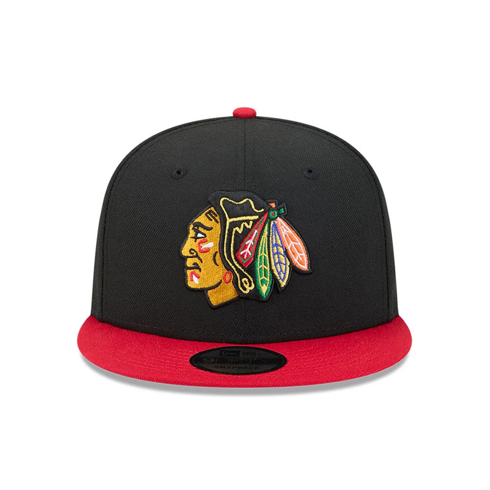 Pictured is this NHL Evergreen Chicago Blackhawks 9FIFTY Snapback cap in black. 3