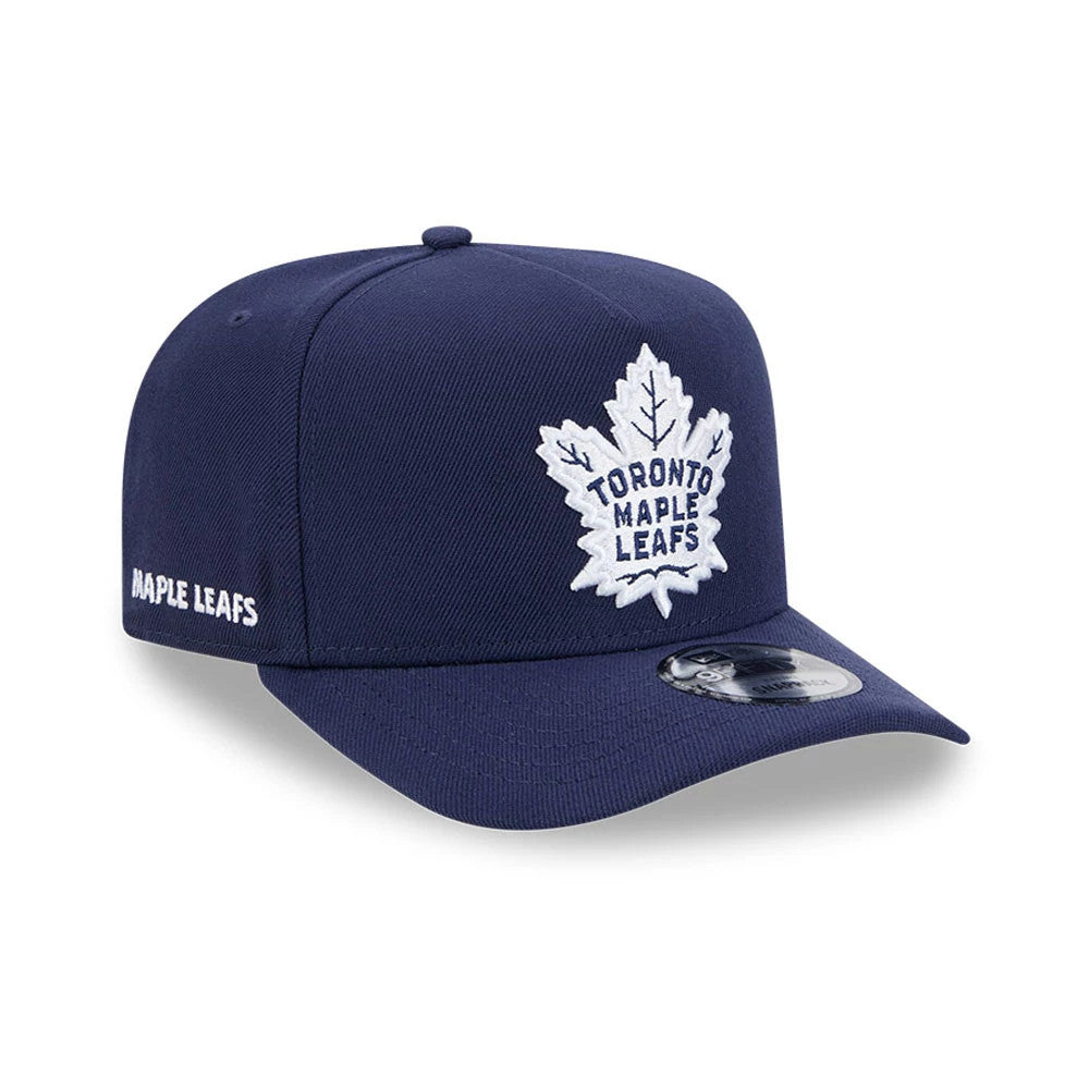 Maple Leafs NHL Evergreen Navy New Era 9FIFTY A-Frame Snapback Adjustable Cap, front view showing the white embroidered leaf logo on the structured navy crown with a matching navy visor and 9FIFTY size sticker.