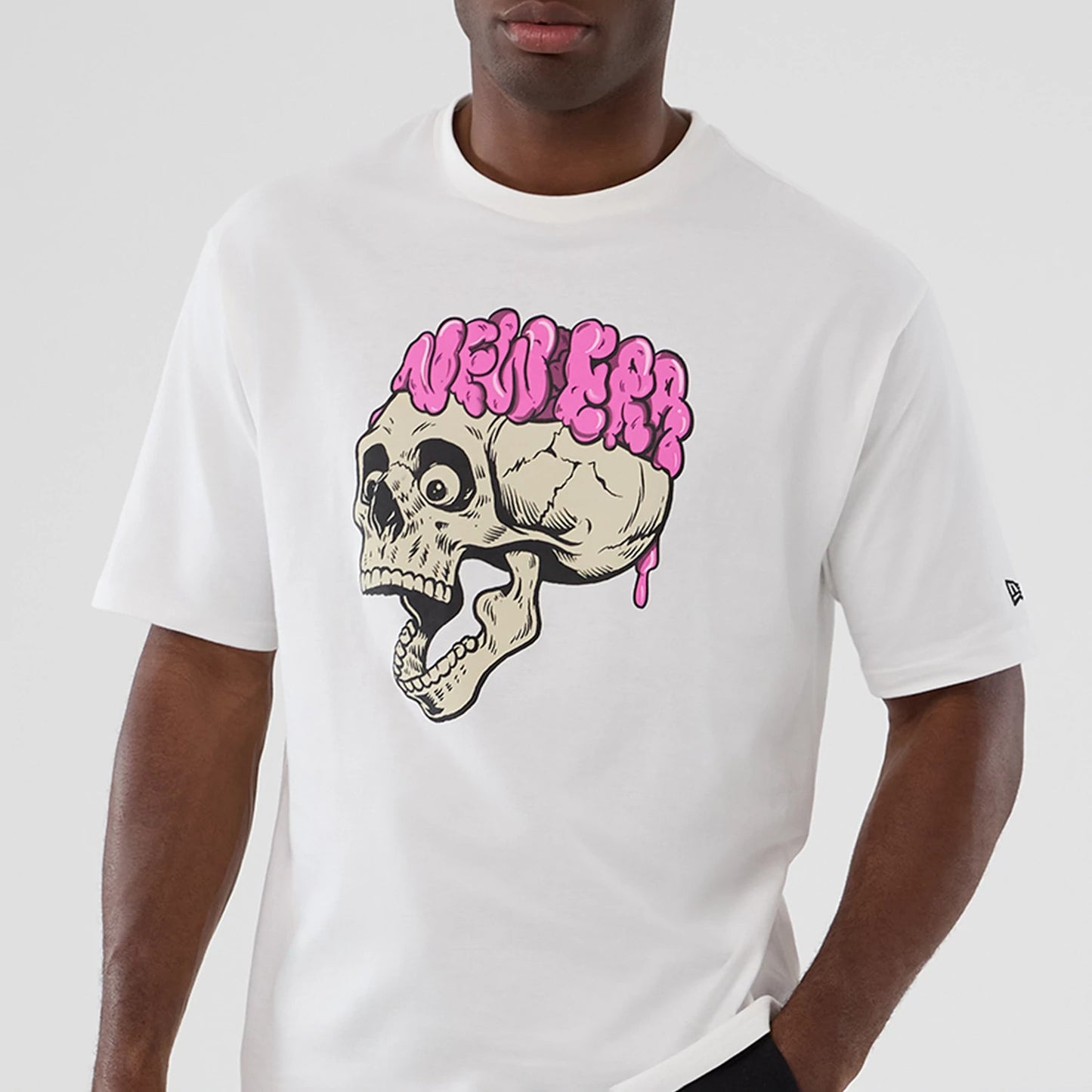 The Male model is wearing  New Era Halloween Skull Graphic White Oversized T-Shirt 6