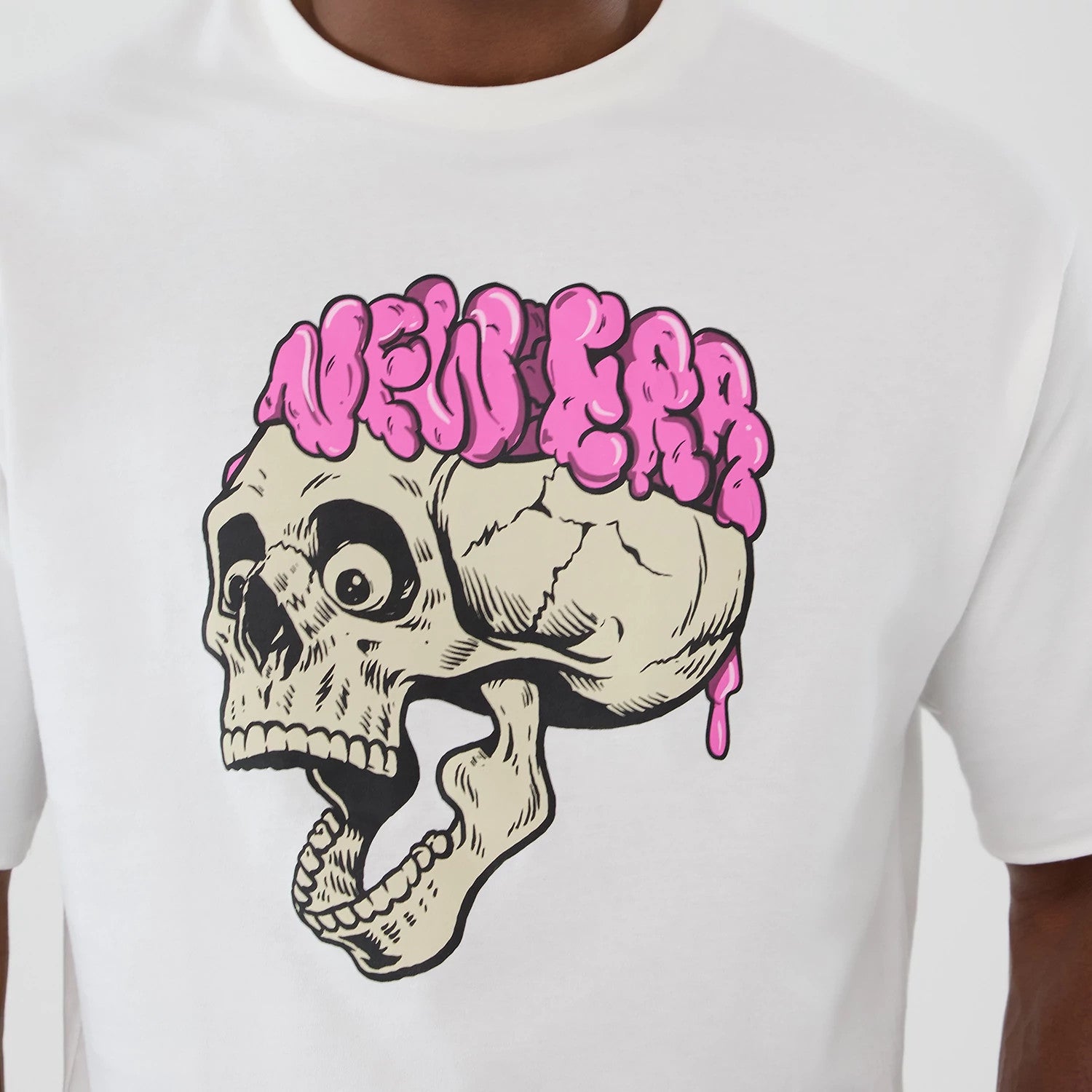 The Male model is wearing  New Era Halloween Skull Graphic White Oversized T-Shirt 3