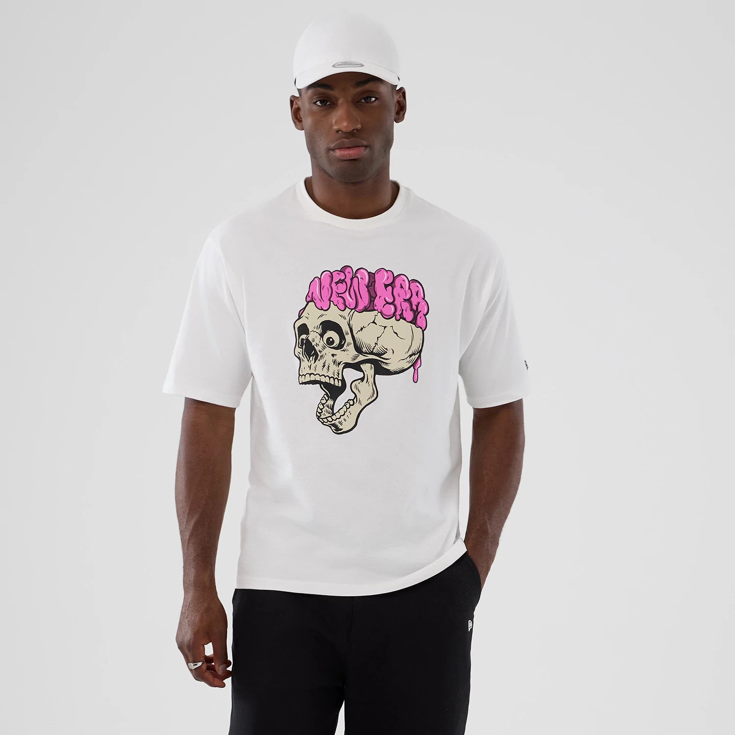 The Male model is wearing  New Era Halloween Skull Graphic White Oversized T-Shirt 1