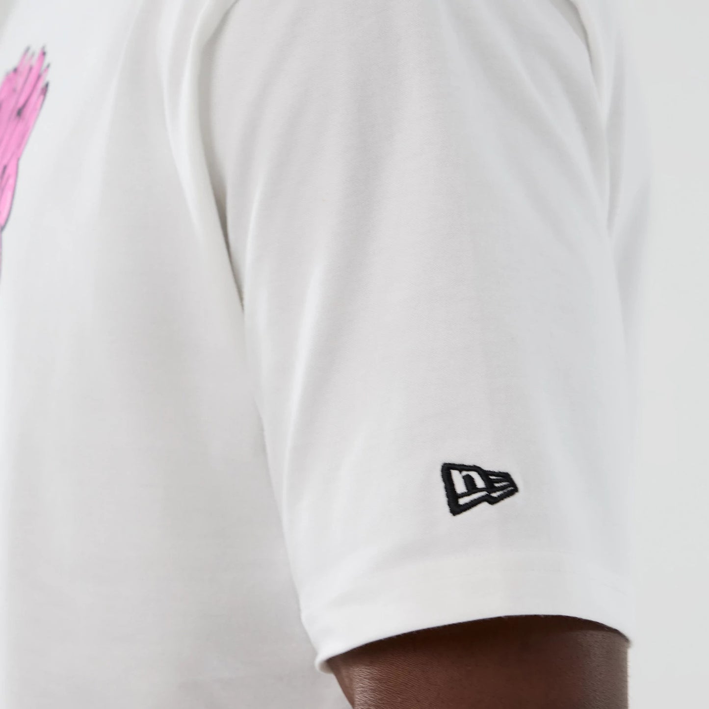 The Male model is wearing  New Era Halloween Skull Graphic White Oversized T-Shirt 4