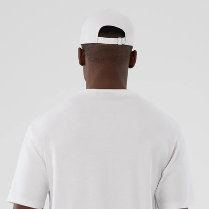 The Male model is wearing  New Era Halloween Skull Graphic White Oversized T-Shirt 7