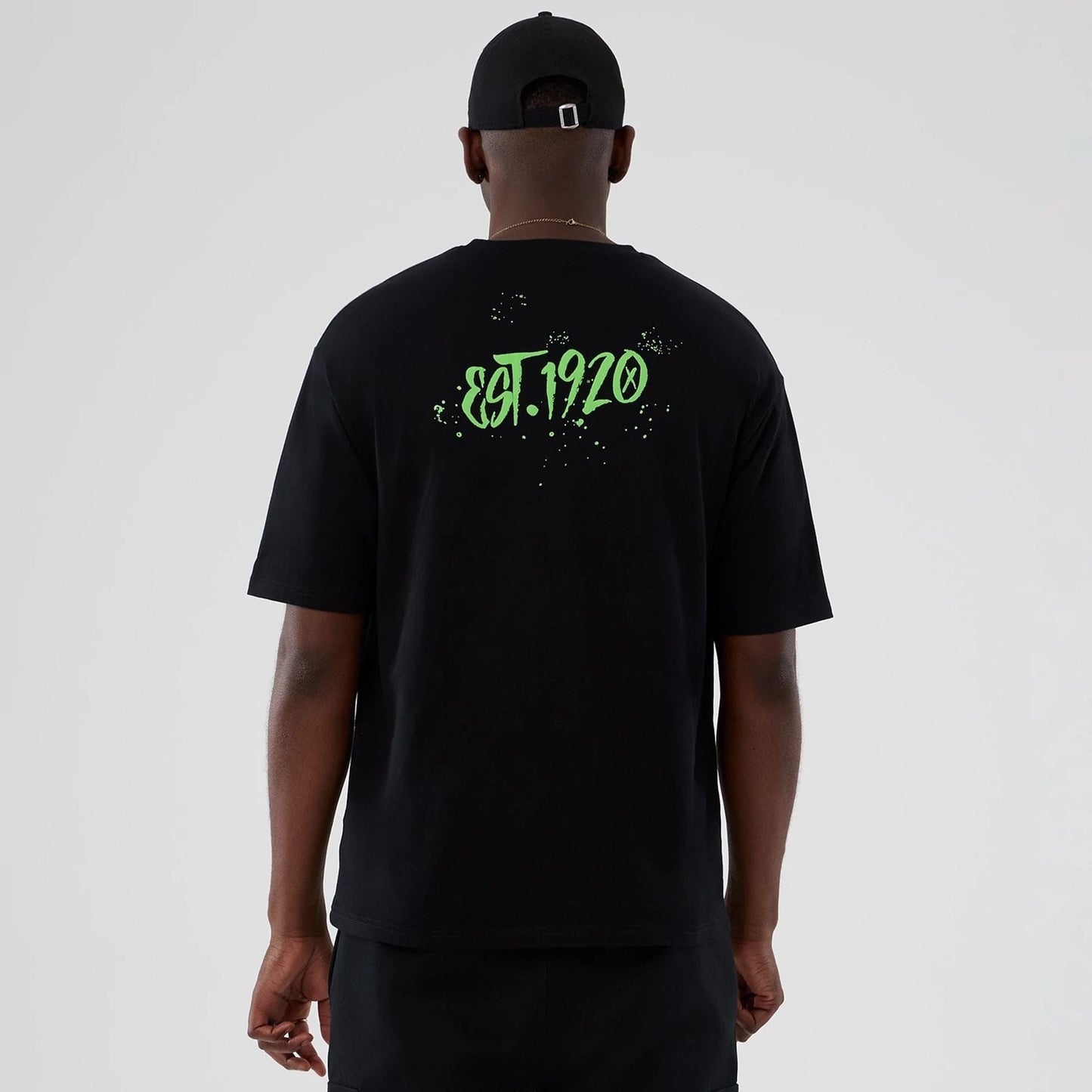 The Male model is wearing  New Era Halloween Clown Graphic Black Oversized T-Shirt  2