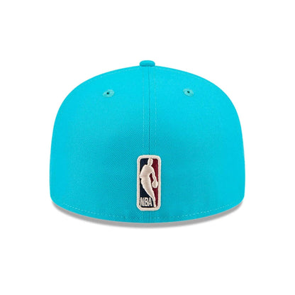 Pictured is this NBA Hardwood Classic Charlotte Hornets 59FIFTY Fitted cap in turquoise. 5