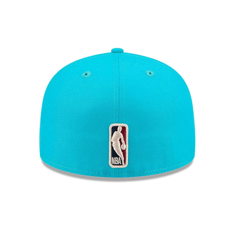 Pictured is this NBA Hardwood Classic Charlotte Hornets 59FIFTY Fitted cap in turquoise. 5