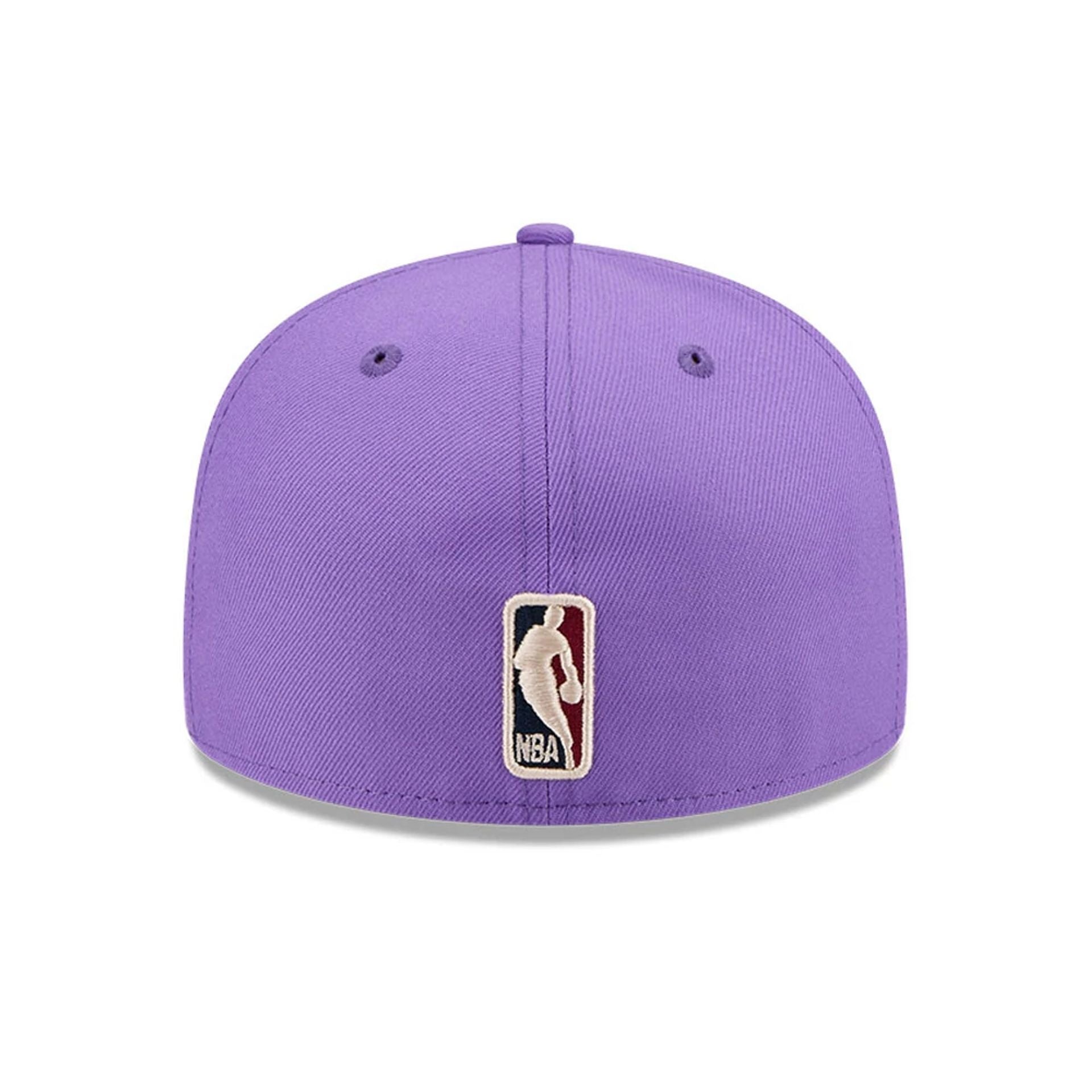 Pictured is this NBA Hardwood Classic Toronto Raptors 59FIFTY Fitted cap in bright purple. 5