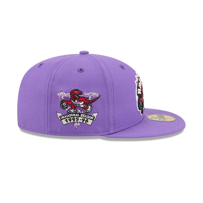 Pictured is this NBA Hardwood Classic Toronto Raptors 59FIFTY Fitted cap in bright purple. 6