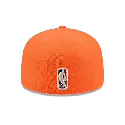 Pictured is this NBA Hardwood Classic Phoenix Suns 59FIFTY Fitted cap in orange. 5