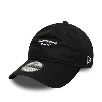 This is a  New Era Slogan Background Talent Black 9TWENTY Adjustable Cap 1