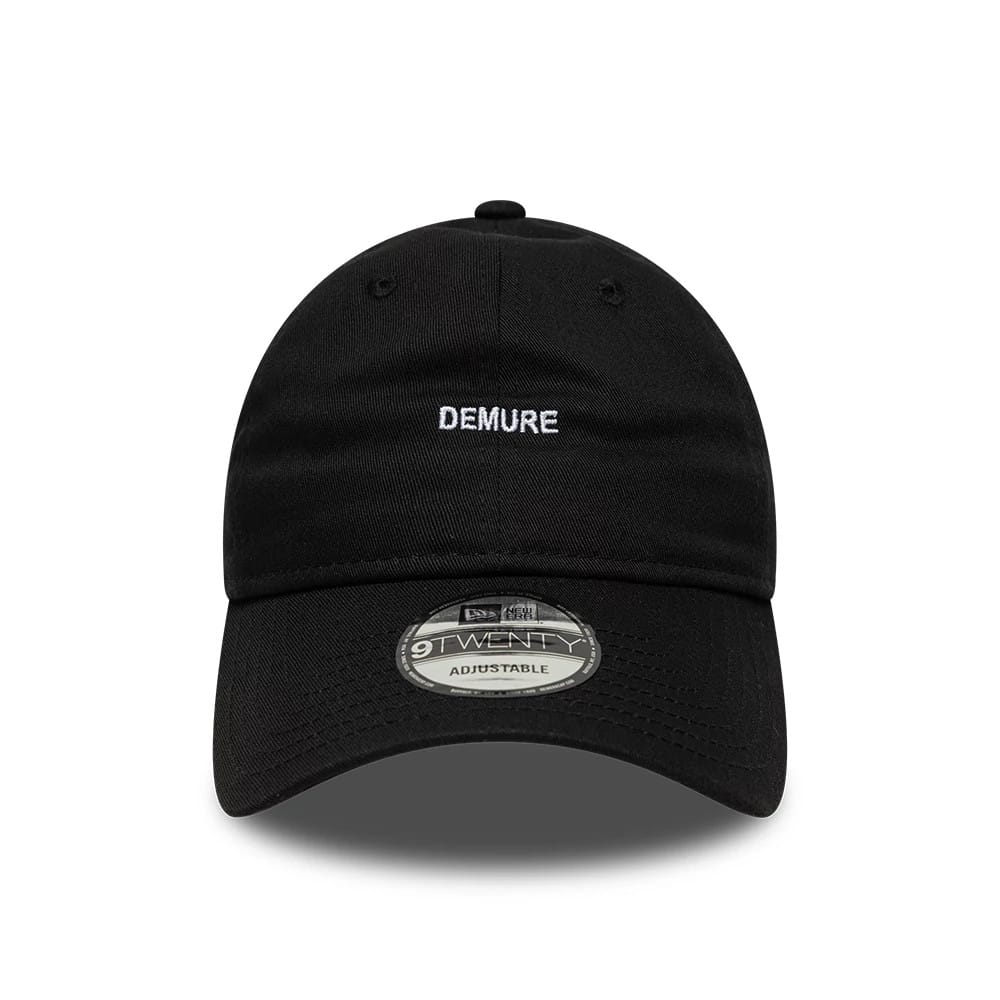 This is a  New Era Slogan Demure Black 9TWENTY Adjustable Cap 2