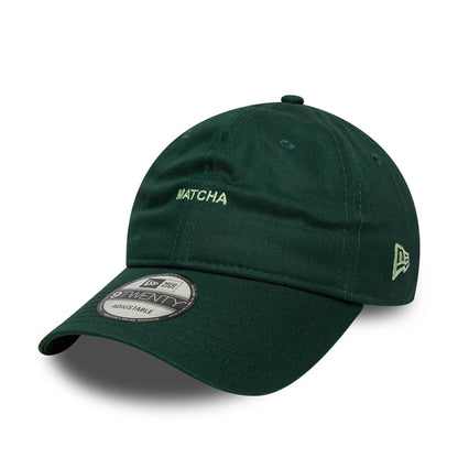 This is a  New Era Slogan Matcha Dark Green 9TWENTY Adjustable Cap 1