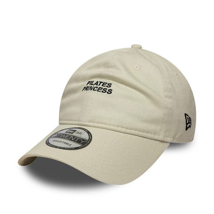 This is a  New Era Slogan Pilates Princess Light Beige 9TWENTY Adjustable Cap 1