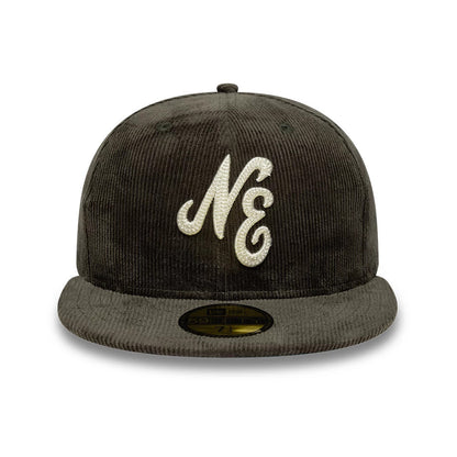 New Era Cord Dark Green 59FIFTY Fitted Cap, front view with white raised embroidered NE logo on the crown, featuring a dark green corduroy finish and a gold 59FIFTY size sticker on the flat visor.