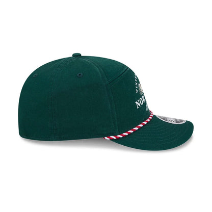Pictured is this New Era Holiday Essentials 9FIFTY Split Panel Snapback cap in dark green. 6