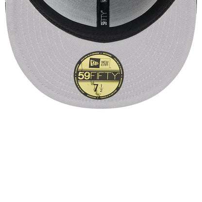 Atlanta Braves MLB Cap Scramble Black New Era 59FIFTY Fitted Cap, inside view showing grey undervisor with a gold 59FIFTY size sticker, black sweatband, and labelled taping with New Era branding along the centre.