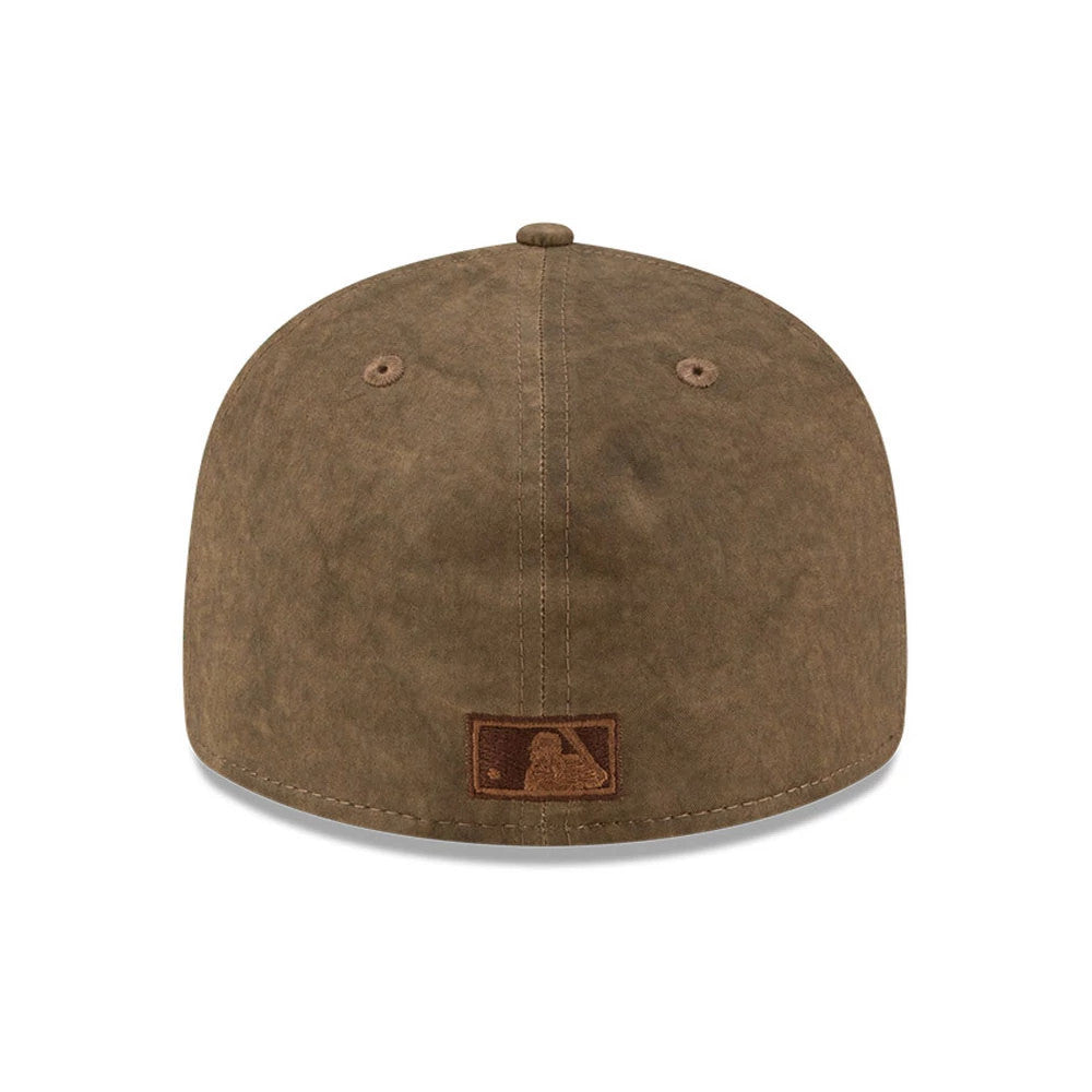 Pictured is this MLB Utility Linen Athletics Retro Crown 59FIFTY Fitted cap in open brown. 7